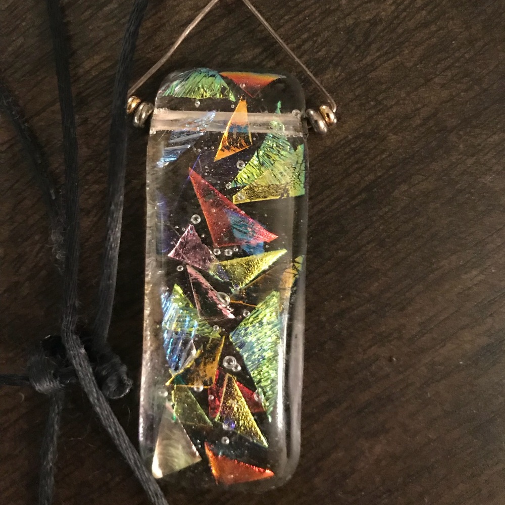 Iridescent glass pendant on silk necklace